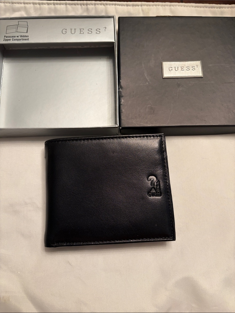 Guess Black Leather Men's Bi-Fold Wallet with Embossed Logo